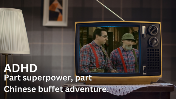 Old TV with picture of two guys in plaid shirts